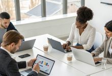 Team of digital marketing professionals analyzing website performance charts and keyword data, representing strategic SEO services for brands aiming to grow online visibility.