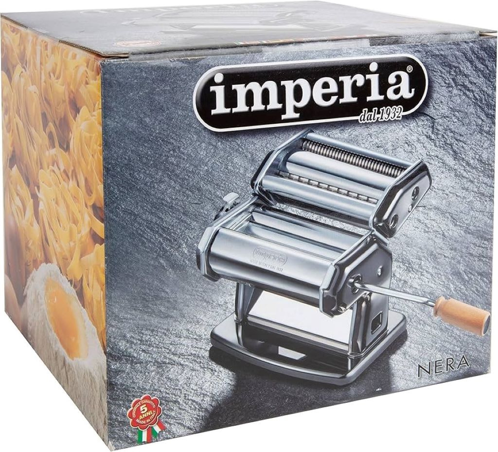 Imperia pasta maker on a kitchen counter highlighting its classic Italian design.