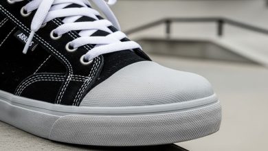 Close-up of reinforced skate shoe showing toe cap protection and durable construction