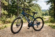 Huffy Stone Mountain Bike with front suspension fork on a gravel trail