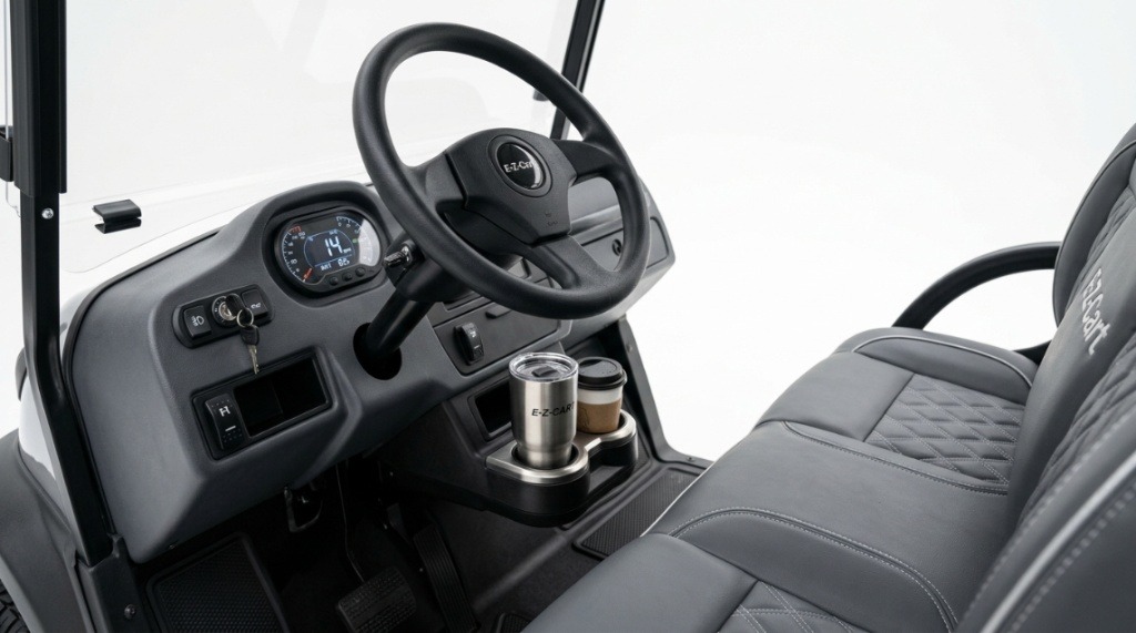 Close up view of the dashboard and seating inside a budget-friendly golf cart.