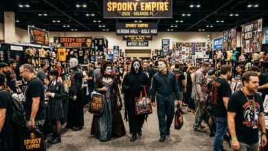 Costumed fans walking through the Spooky Empire 2026 vendor hall in Orlando