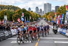 Elite cyclists racing through the Mont-Royal circuit on Avenue du Parc during the UCI Road World Championships 2026 in Montréal, Canada