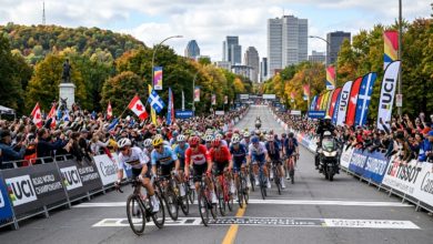Elite cyclists racing through the Mont-Royal circuit on Avenue du Parc during the UCI Road World Championships 2026 in Montréal, Canada