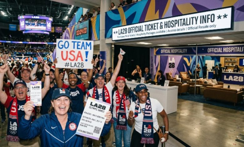Fans celebrating inside an LA28 Olympics venue with ticket and hospitality information