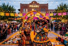 Colorful Catrina costumes and marigold decorations at the Día de los Muertos festival at Pearl in San Antonio, Texas