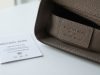Checking a Michael Kors bag for authenticity details