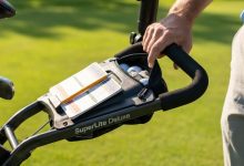 Lightweight SuperLite Deluxe Golf Push Cart on green golf course fairway